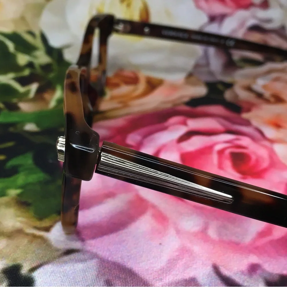 Versace orange & black tortoise frames glasses  Silver medusa face logo corners